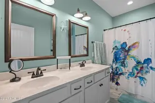 129 NW 11th Street, Oak Island, NC 28465 – photo 19: master bath