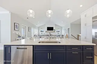 109 Ocean Bluff Drive, Indian Beach, NC 28512 – photo 17: Kitchen and Living Room