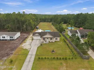 337 Folkstone Road, Holly Ridge, NC 28445 – photo 5: 6-web-or-mls-DJI_20260924091505_0007_D