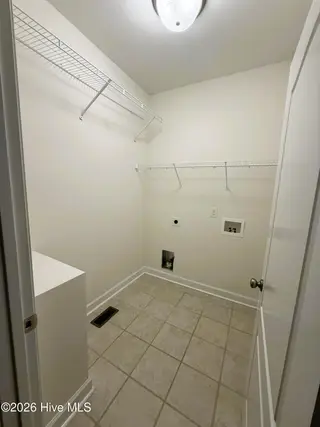 103 Castelnau Court, Jacksonville, NC 28540 — 5-bedroom home in Williamsburg Plantation, Jacksonville, NC, photo 13 of 52: 7. Laundry Rm
