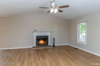 316 Jeannine Drive, Goldsboro, NC 27534 — 3-bedroom home in Kelliwood, Goldsboro, NC, photo 4 of 37: fireplace