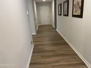 1439 New Sun Drive SE, Bolivia, NC 28422 — 4-bedroom home in Olde Georgetowne, Bolivia, NC, photo 5 of 15: 1439 Hallway