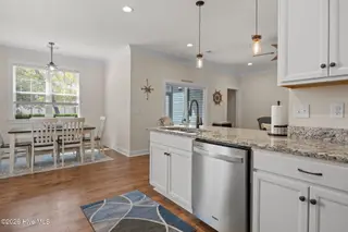 129 NW 11th Street, Oak Island, NC 28465 – photo 12: kitchen-dining