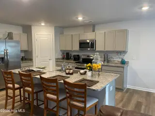 1439 New Sun Drive SE, Bolivia, NC 28422 — 4-bedroom home in Olde Georgetowne, Bolivia, NC, photo 7 of 15: 1439 kitchen