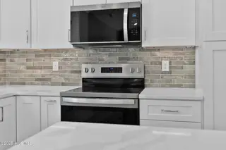 223 NE 75th Street, Oak Island, NC 28465 – photo 14: 223 NE 75th St-17
