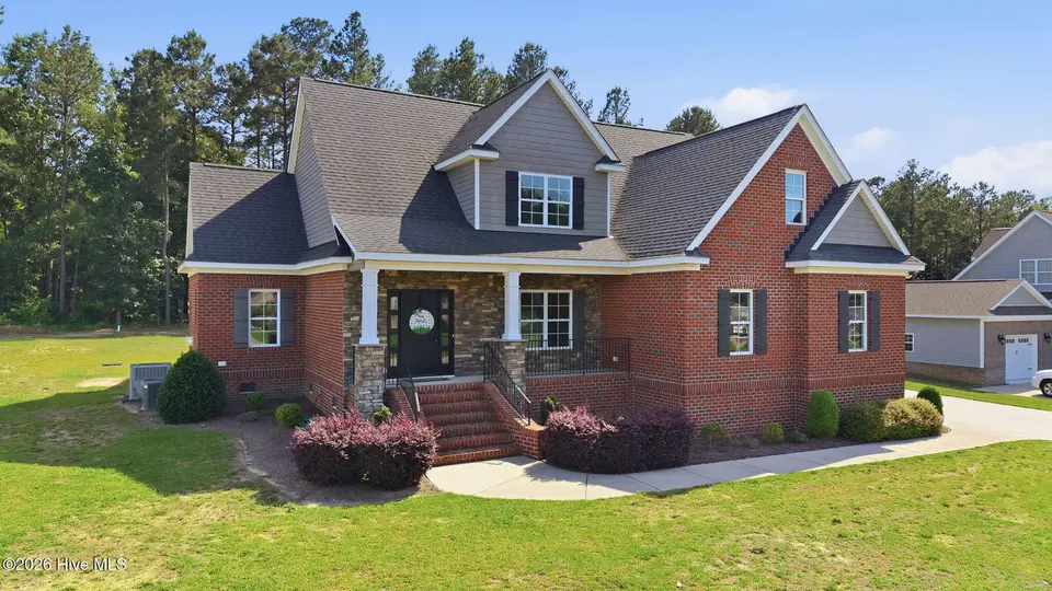 1665 Blue Heron Drive, Nashville, NC 27856 – photo 1 of 52: 2-web-or-mls-DJI_20260529161259_0306_D