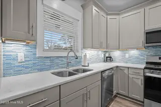 245 NE 64th Street, Oak Island, NC 28465 – photo 18: 32-web-or-mls-DSC04951