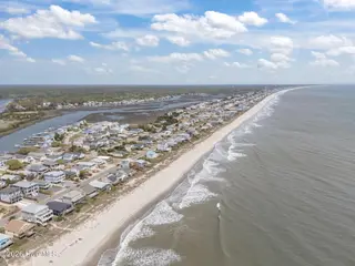 3909 W Beach Drive, Oak Island, NC 28465 – photo 24: 14-web-or-mls-DJI_20260408140537_0421_D