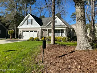 909 Oyster Pointe Drive, Sunset Beach, NC 28468 – photo 3: IMG_5354