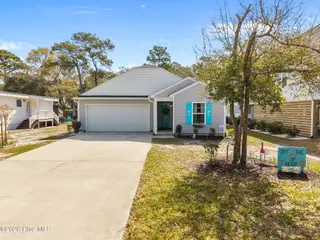 152 NW 10th Street, Oak Island, NC 28465 – photo 1: 1-web-or-mls-DJI_20260330110602_0844_D