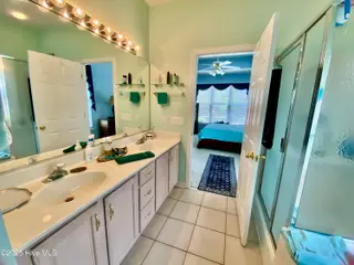 7599 Dunbar Drive SW, Sunset Beach, NC 28468 – photo 22: Primary Bath