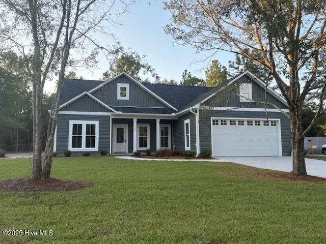 3181 Blue Banks Loop Road NE, Leland, NC 28451 – photo 1 of 1: 3181 Front