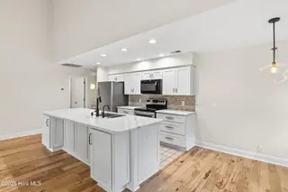 212 Kings Trail # A, Sunset Beach, NC 28468 – photo 6: Upstairs kitchen