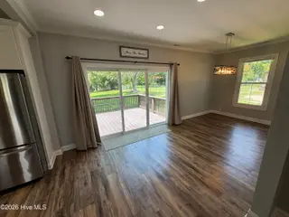 702 N Charlotte Street, Washington, NC 27889 – photo 13: sliding rear door and large dining area