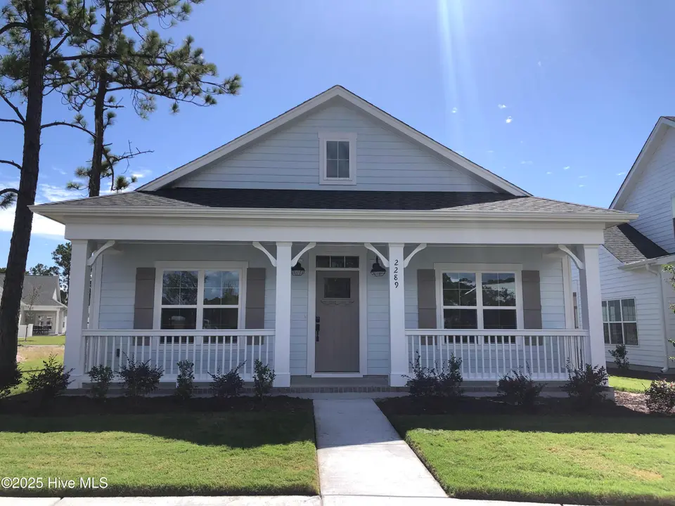 2289 Crescent Bay Drive, Southport, NC 28461 – photo 1 of 33: Front of Home