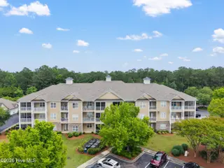 221 Woodlands Way Unit 21, Calabash, NC 28467 — 2-bedroom condo in Crow Creek, Calabash, NC, photo 2 of 39: Front of Building