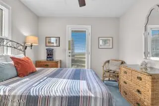 6707 Kings Lynn Drive, Oak Island, NC 28465 – photo 19: bed 3 3