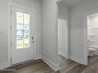 114 Edgewater Way, Surf City, NC 28445 – photo 10: TulipPoplar21102foyDRHL33A7123-003-012-1