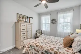142 Rice Marsh Way, Wilmington, NC 28412 — 3-bedroom home in Bella Port, Wilmington, NC, photo 10 of 62: 142 RICE MARSH WAY - 1ST FLOOR GUEST BED