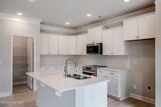 1025 Wood Creek Road NE, Leland, NC 28451 – photo 11: *REPRESENTATIVE PHOTO* Kitchen