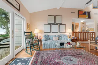 590 Westport Drive H1 Westport, Pine Knoll Shores, NC 28512 – photo 8: Living room with sound views