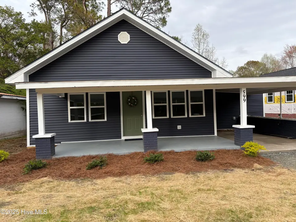 599 Bitmore Road, Whiteville, NC 28472 – photo 1 of 25: Front exterior view of the home