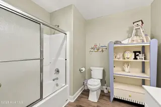 9936 Louise Howard Court East, Emerald Isle, NC 28594 — 3-bedroom townhome in Spinnakers Reach, Emerald Isle, NC, photo 8 of 32: Ground Floor Bedroom 4 full bath
