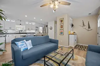 111 NW 10th Street, Oak Island, NC 28465 – photo 12: 23 living room