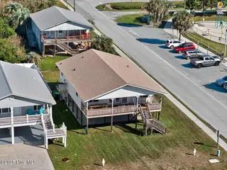 4328 E Dolphin Drive, Oak Island, NC 28465 – photo 3: 03-kahunaphoto