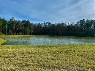 525 Belfort Lane SW 79, Ocean Isle Beach, NC 28469 – photo 3: 79 pond view