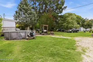 103 W Julian Avenue, Stantonsburg, NC 27883 – photo 4: 103 W. Julian Back yard 3