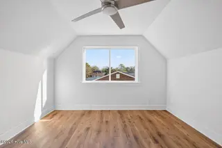 501 Shoreline Drive E, Sunset Beach, NC 28468 – photo 23: Third bedroom suite, upstairs