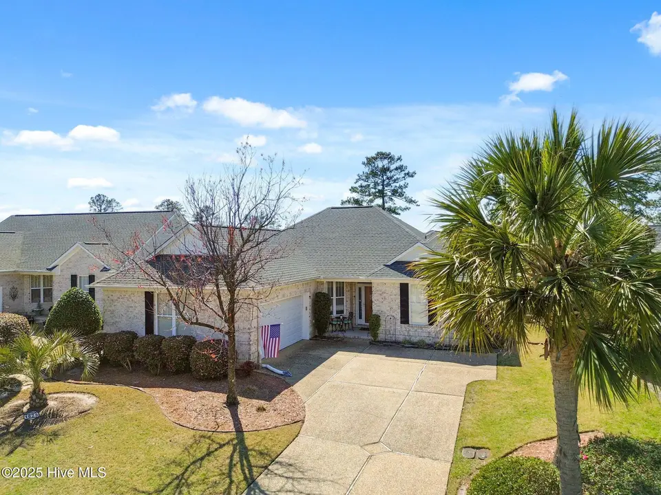 1025 Garden Club Way, Leland, NC 28451 – photo 1 of 33: 2-web-or-mls-DJI_0199