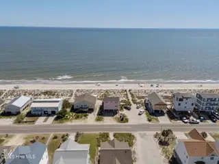 601 E Beach Drive, Oak Island, NC 28465 – photo 3: 16-web-or-mls-DJI_20250903145036_0381_D