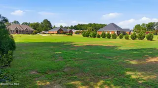 5818 Nobleman Court, Elm City, NC 27822 – photo 7: 16-web-or-mls-dji_fly_20260818_100024_02
