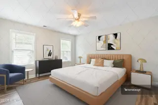 114 NW 11th Street, Oak Island, NC 28465 – photo 23: Owners Suite Virtually staged