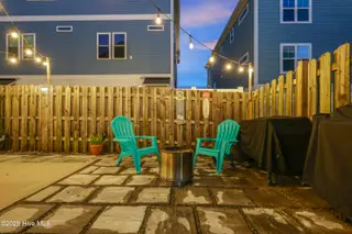 1225 Pinfish Lane, Carolina Beach, NC 28428 – photo 7: backyard fire pit area