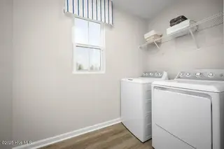 8103 Sterling Oaks Drive NW, Ash, NC 28420 – photo 4: Laundry