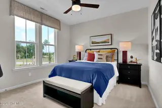 1218 Sunwater Terrace, Leland, NC 28451 — 4-bedroom townhome in Grand Park, Leland, NC, photo 23 of 49: Bedroom - Hyacinth BE - Grand Park