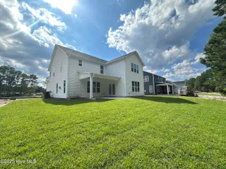 33 S Bandwheel Way, Hampstead, NC 28443 – photo 12: 33 S Bandwheel backyard