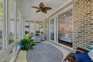 8309 Oak Abbey Trail NE, Leland, NC 28451 — 3-bedroom home in Compass Pointe, Leland, NC, photo 24 of 66: Sunroom