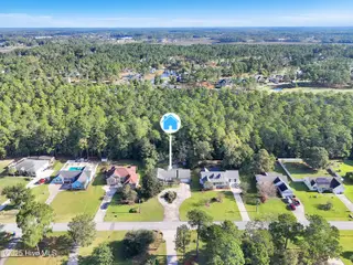 60 Country Club Drive, Shallotte, NC 28470 – photo 4: 60-Final Drone 60 Country Club Dr Shallo