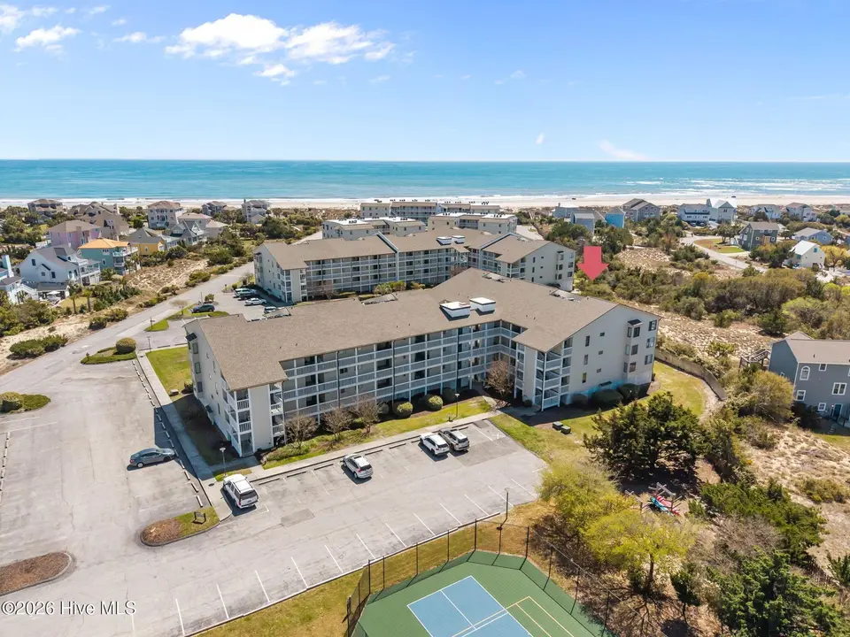 10300 Coast Guard Road 107-E, Emerald Isle, NC 28594 – photo 1 of 51: 4-web-or-mls-DJI_20260402133614_0233_D