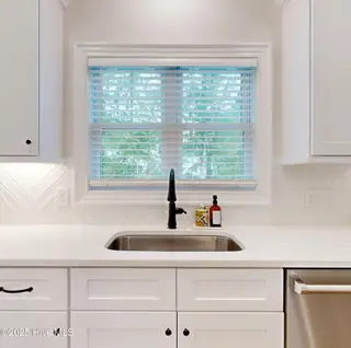 4101 Dunhagan Road, Greenville, NC 27858 – photo 18: Kitchen sink with view of backyard