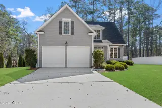 6509 Walden Pond Lane, Southport, NC 28461 — 3-bedroom home in Winding Creek, Southport, NC, photo 1 of 72: front view