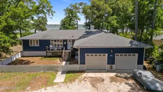 124 Oakleaf Drive, Pine Knoll Shores, NC 28512 – photo 2: 7-web-or-mls-DJI_20250612112743_0599_D