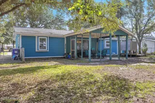 209 NE 56th Street, Oak Island, NC 28465 – photo 6: 13-Final 209 NE 56th St OKI-RJREM-9395