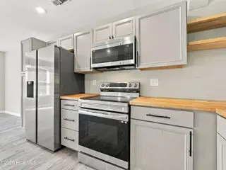508 Redwood Place 2, Jacksonville, NC 28540 — 3-bedroom condo in Shamrock Village, Jacksonville, NC, photo 6 of 35: Butcher Block Counter Tops