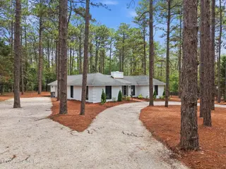 355 Serpentine Drive, Southern Pines, NC 28387 – photo 7: 18-web-or-mls-DJI_20260526113203_0281_D