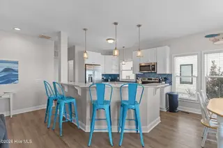 6634 Kings Lynn Drive, Oak Island, NC 28465 – photo 16: 19-web-or-mls-BTS06104